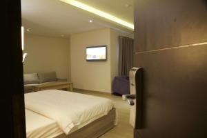 Letto o letti in una camera di Scarlet Lodge