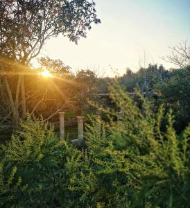 The sunrise or sunset as seen from a panziókat or nearby