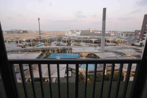 a view of a city from a balcony at Duplex-Nyoum New Cairo in Cairo