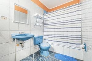 Koupelna v ubytování Kurmi Hostel Lima Airport