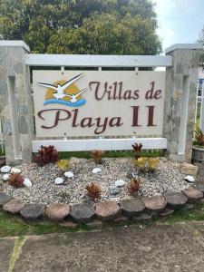 a sign for the willias de playa ii at New-Paradisus Beach & Pool-Best rate guaranteed! in Dorado