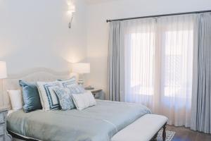 Postel nebo postele na pokoji v ubytování Casa Grande + 10 fotografií