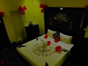 Voodi või voodid majutusasutuse R Hotels By Suraj Residency Yercaud toas
