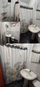 a bathroom with two sinks and a shower curtain at Vicencio in Ayacucho