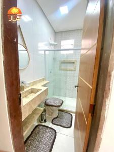 Ett badrum på Casa em Paripueira, conforto e privacidade