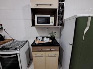 Кухня или мини-кухня в Lindo 3qts Vaga Garagem 5 min Praia do Recreio
