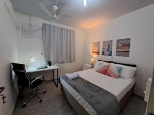 Кровать или кровати в номере Lindo 3qts Vaga Garagem 5 min Praia do Recreio