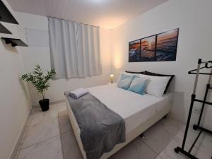 Кровать или кровати в номере Lindo 3qts Vaga Garagem 5 min Praia do Recreio