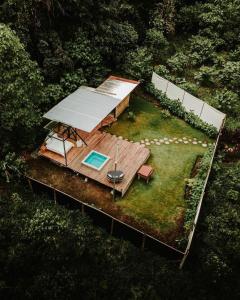 an overhead view of a house with a deck at Macas Glamping in Macas