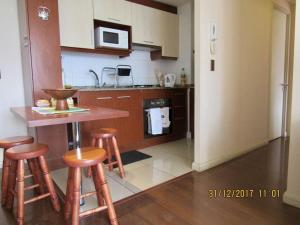 Kuchyň nebo kuchyňský kout v ubytování Gran Ubicacion, Estacionamiento y Piscina