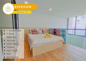 a bedroom with a bed with a teddy bear on it at Cozy Duplex, Quiet Stay with MRT View #SP1 in Cyberjaya