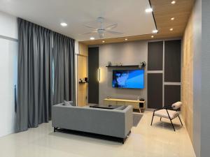 A television and/or entertainment centre at MR homestay depo link