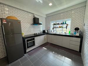 Køkken eller tekøkken på MR homestay depo link + 5 billeder