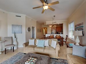 a living room with a couch and a table at Adagio 301e in Santa Rosa Beach