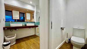 Koupelna v ubytování Appartement de luxe piscine et vue mer