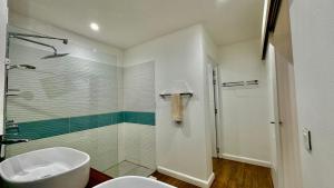 Koupelna v ubytování Appartement de luxe piscine et vue mer