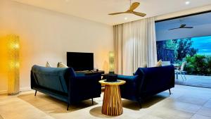 Posezení v ubytování Appartement de luxe piscine et vue mer
