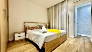 Postel nebo postele na pokoji v ubytování Appartement de luxe piscine et vue mer