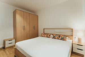 Postel nebo postele na pokoji v ubytování Appartement de luxe piscine et vue mer