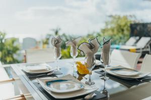 Nápoje v ubytování Appartement de luxe piscine et vue mer