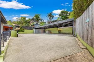 an empty parking lot in front of a building at Unit 1 Sunbird on Lamond in Airlie Beach