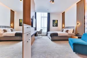 Postel nebo postele na pokoji v ubytování Hotel Boka