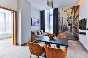 TV a/nebo společenská místnost v ubytování Hotel Boka