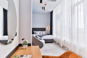 Postel nebo postele na pokoji v ubytování Hotel Boka