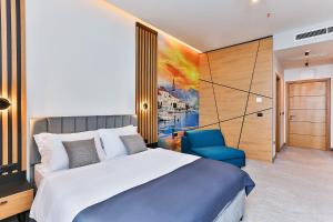 Postel nebo postele na pokoji v ubytování Hotel Boka