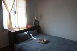 Postel nebo postele na pokoji v ubytování Thịi house