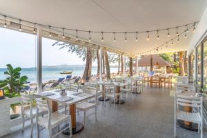 Restoran või mõni muu söögikoht majutusasutuses Best Western Premier Bangtao Beach Resort & Spa