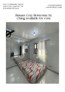 Postel nebo postele na pokoji v ubytování Butuan Cozy Homestay by Ching