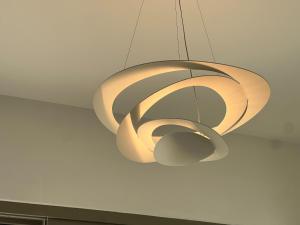 a light fixture hanging from a ceiling at Villa Serene Milos in Empourios