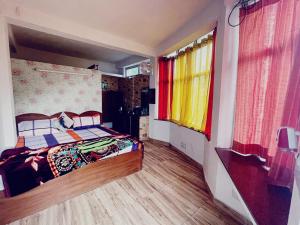 Voodi või voodid majutusasutuse The Himalaya Retreat Resort, Experience Nature in the Lap of Himalayas toas