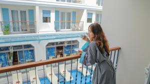 Rõdu või terrass majutusasutuses Amina Lantana Hoi An Hotel & Spa