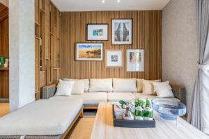 a living room with a couch and a table at Alveshouse Suite Bali Villa - Nusa Dua in Ungasan