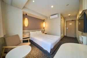 Voodi või voodid majutusasutuse Via inn Kyoto Shijomuromachi toas
