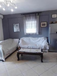 Posezení v ubytování SOFI APARTMENT