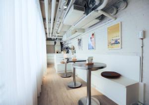 Area soggiorno di Wondertime Taipei Station - Kaifeng Ladies Hostel