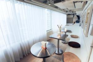 Area soggiorno di Wondertime Taipei Station - Kaifeng Ladies Hostel