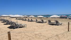 A beach at or near az apartmanhoteleket