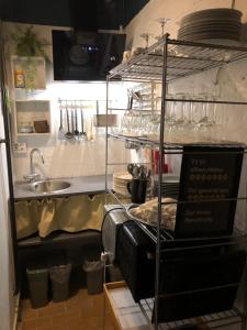A kitchen or kitchenette at Børglum Mejeri Hotel