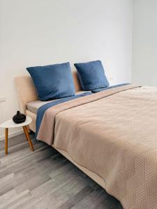 Postel nebo postele na pokoji v ubytování Apartment Weikersheim IV