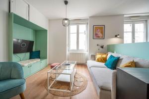 Ruang duduk di Mâcon Cozy / Appartement central 100m² / 8 pers