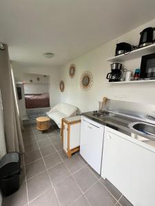 Kuchyň nebo kuchyňský kout v ubytování Lalyne- Maison de charme à Trouville sur mer