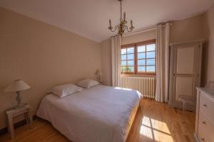 Postel nebo postele na pokoji v ubytování Savoielac - Lac d'Annecy - Sévrier - Bord de lac : Villa Poisson Rouge