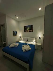 Katil atau katil-katil dalam bilik di B&B Smart Station Caserta