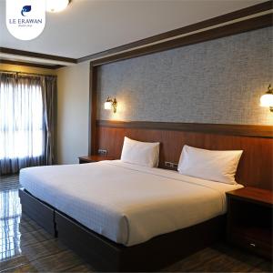 Le Erawan Phang Nga Hotel客房内的一张或多张床位