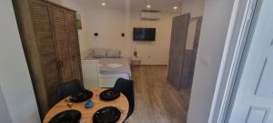TV a/nebo společenská místnost v ubytování Villa Mediterranea - Apartments