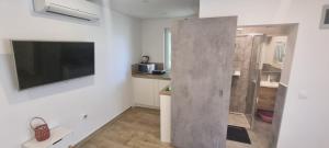 Kuchyň nebo kuchyňský kout v ubytování Villa Mediterranea - Apartments